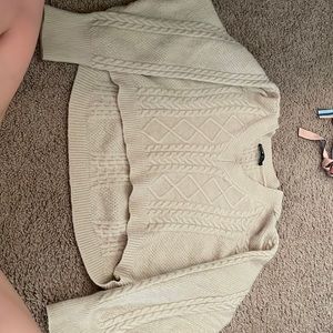 A beige sweater